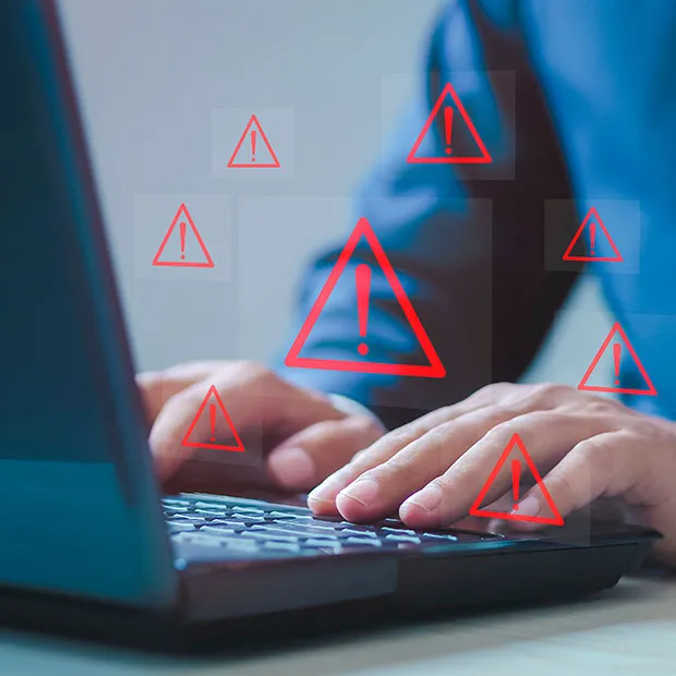 A decorative image of someone browsing the web and seeing alert icons.