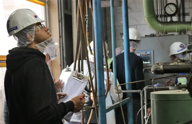 OUC conservation specialist conducting a business energy and water audit.