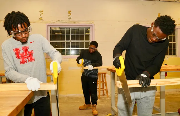 Students learning trade skills at the Empowerment Zone