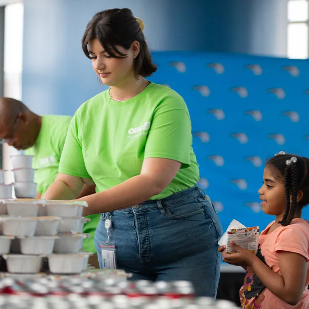 OUC employee at a volunteer event