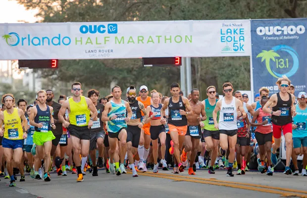 OUC Orlando Half Marathon photo with runners just starting the race