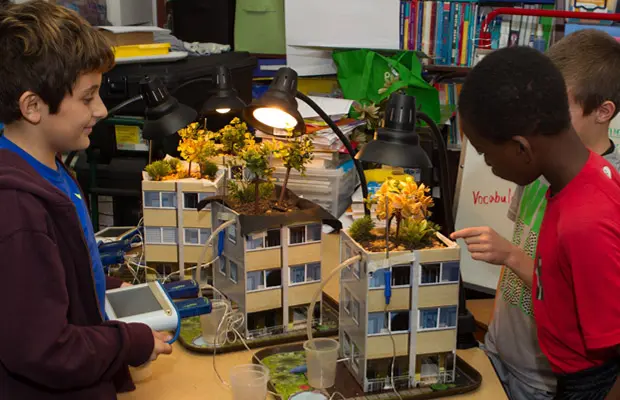 Students learning about solar power in science class
