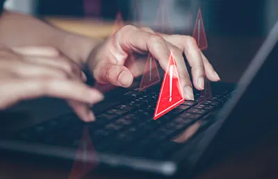 An individual browsing the internet and seeing alert icons pop up. 